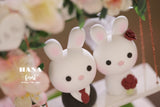 bunny and rabbit wedding cake topper