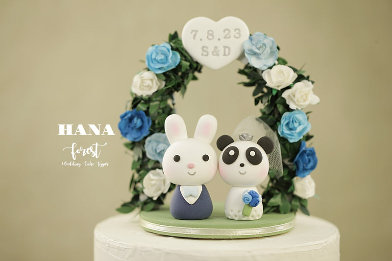 panda and bunny wedding cake topper