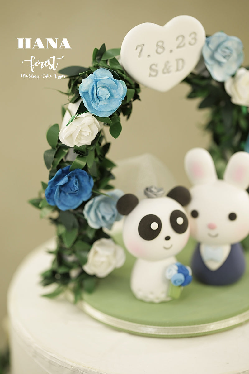 panda and bunny wedding cake topper