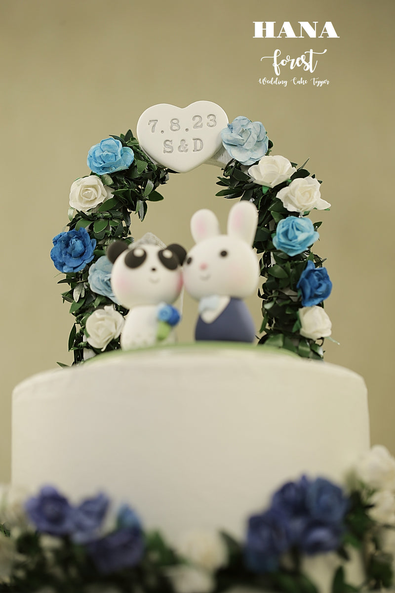 panda and bunny wedding cake topper