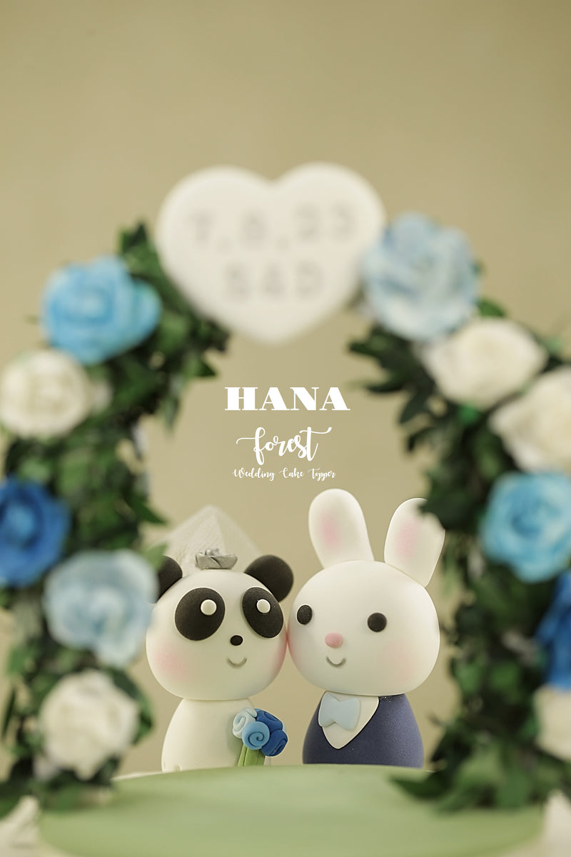 panda and bunny wedding cake topper