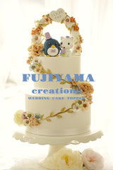 Penguin and white fox Wedding Cake Topper