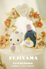 Penguin and white fox Wedding Cake Topper