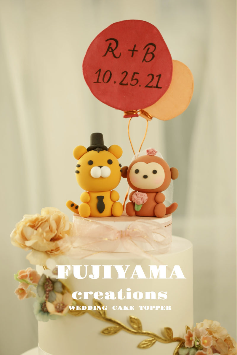 monkey and tiger wedding cake topper