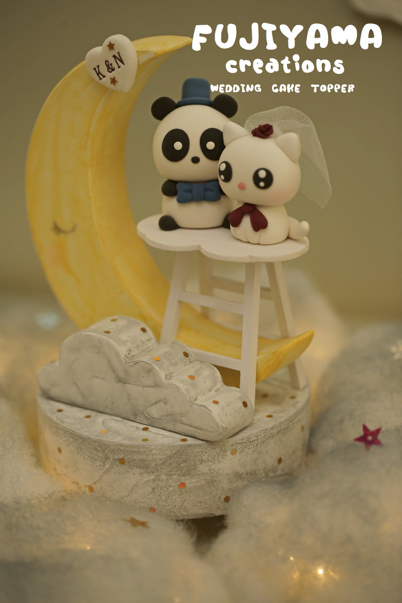 kitty and panda wedding cake topper