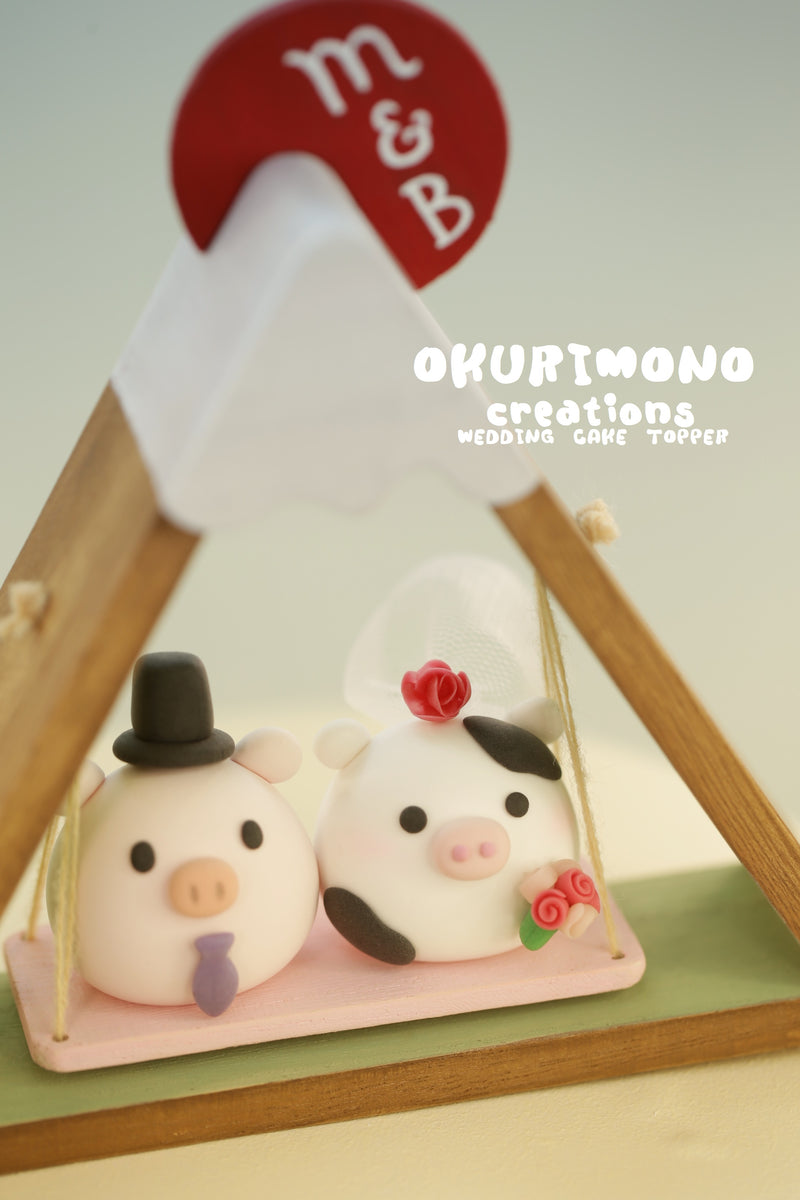 pig and cow wedding cake topper