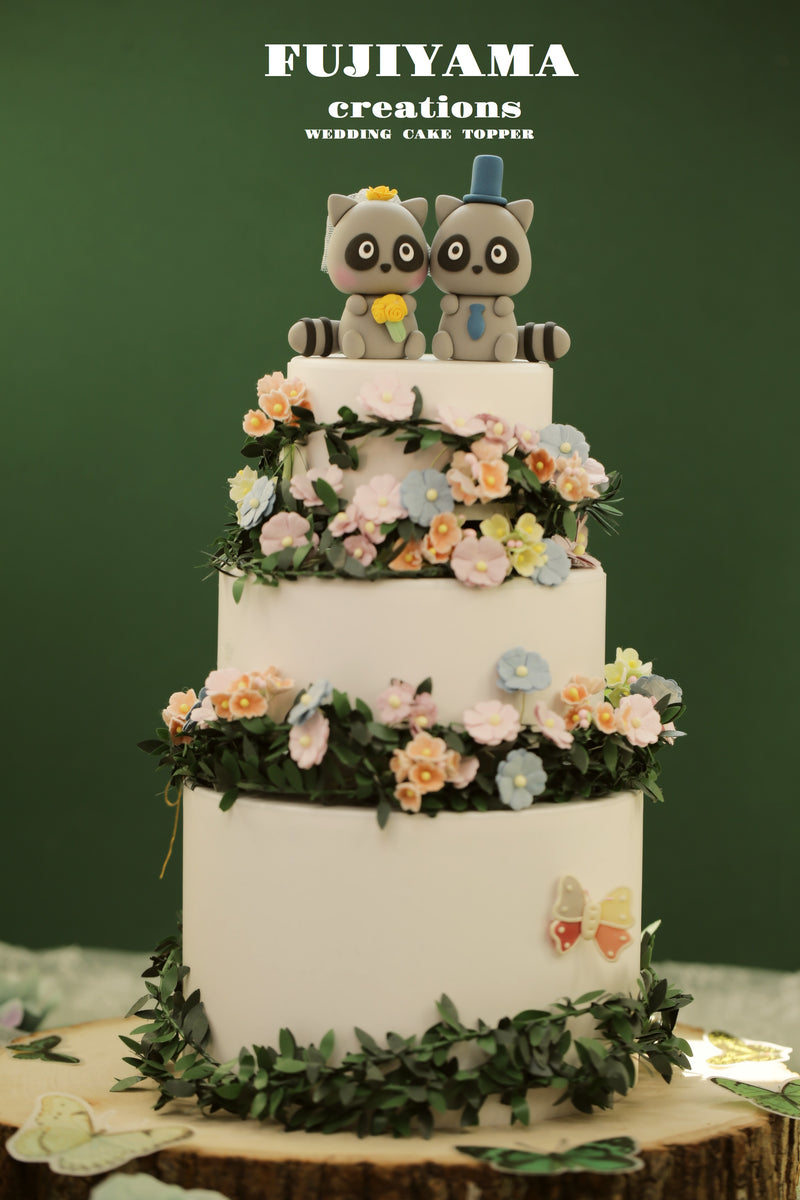 raccoon wedding cake topper