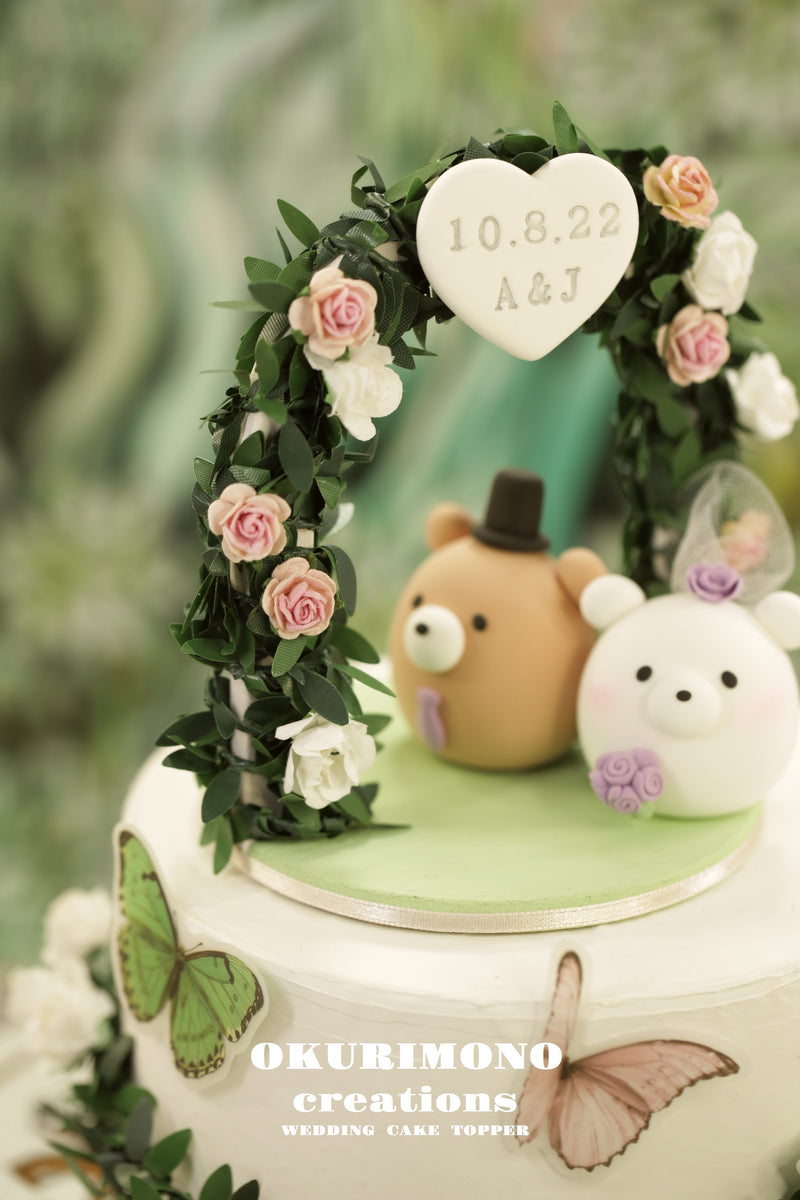 panda and polar bear wedding cake topper