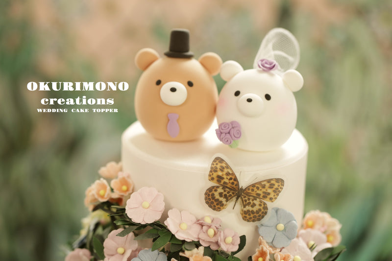 panda and polar bear wedding cake topper