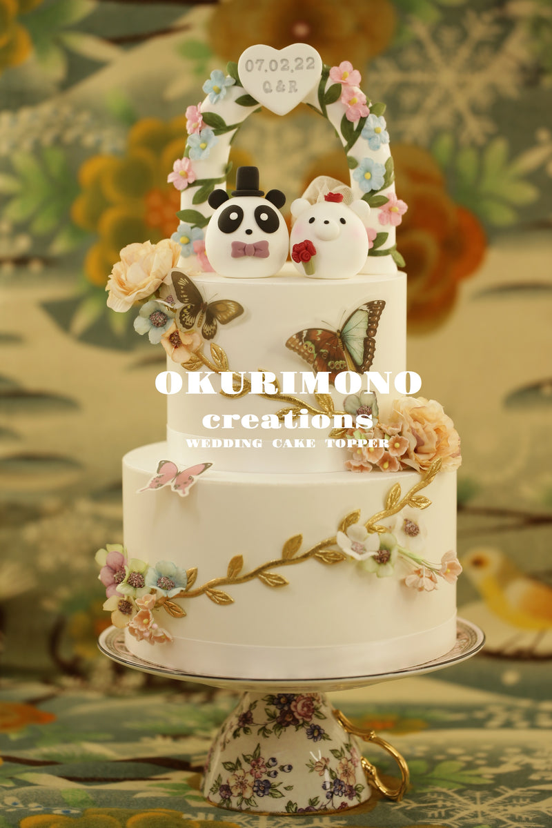 panda and polar bear wedding cake topper