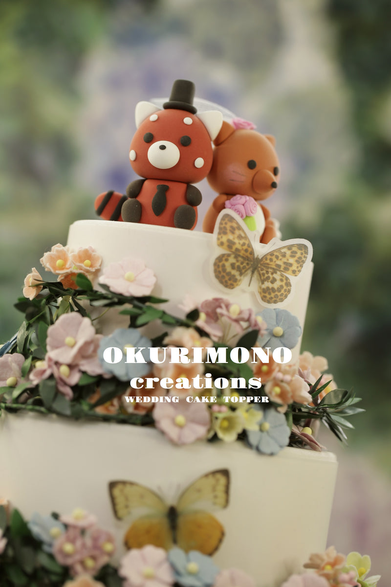 fox and red panda wedding cake topper