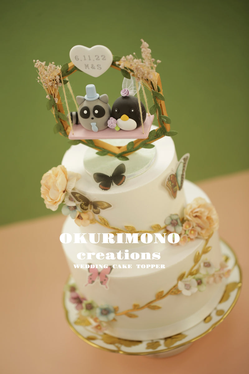 penguin and raccoon Wedding Cake Topper