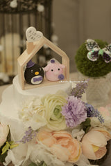 pig and penguin wedding cake topper