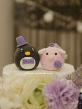 pig and penguin wedding cake topper