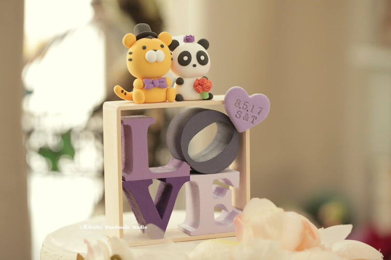 tiger and panda wedding cake topper