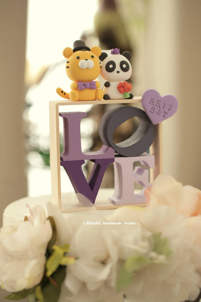 tiger and panda wedding cake topper