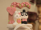 panda and bunny wedding cake topper