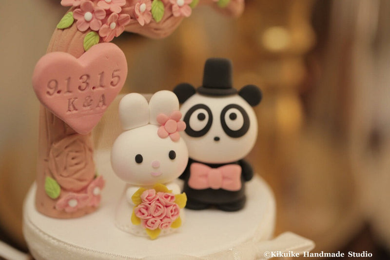 panda and bunny wedding cake topper