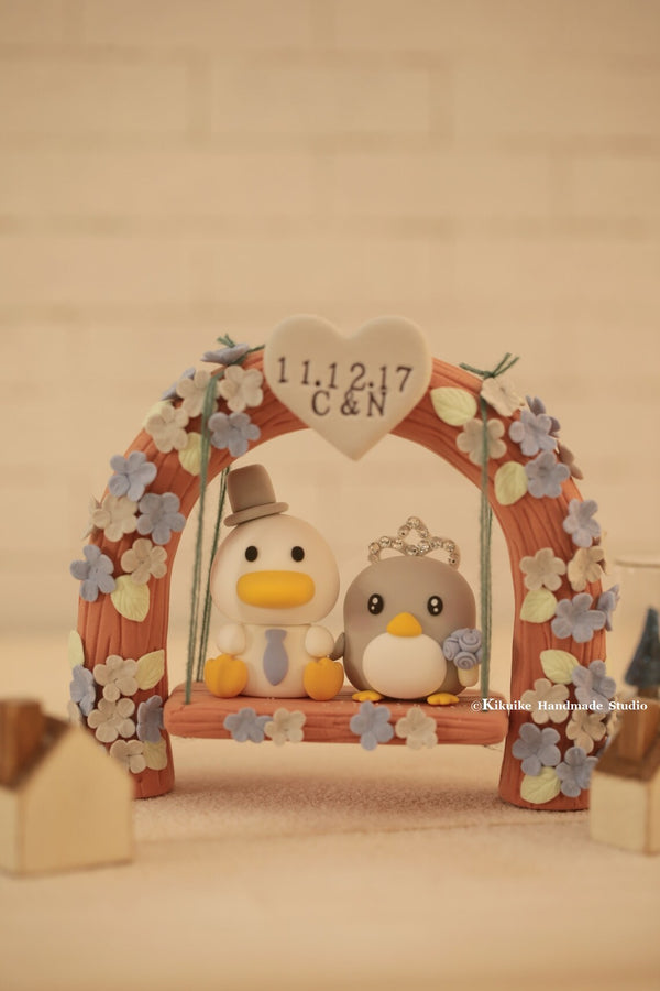 Penguin and Duck Wedding Cake Topper