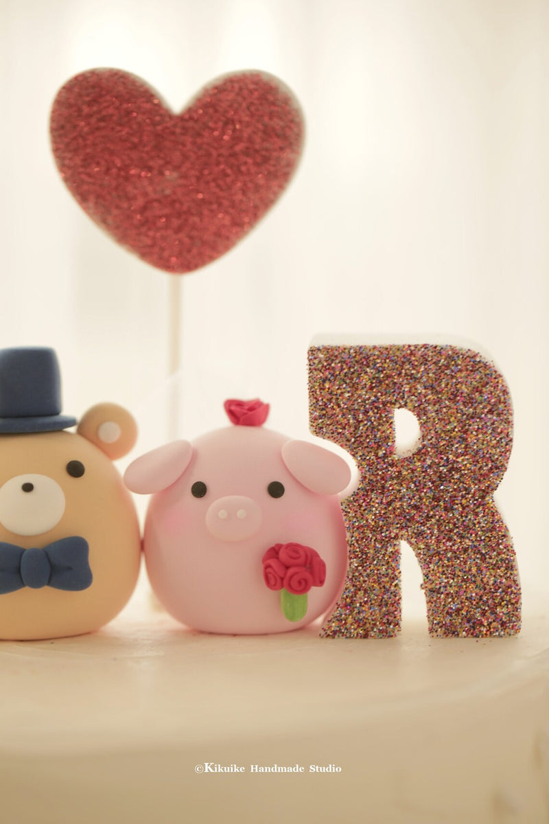 pig and bear wedding cake topper