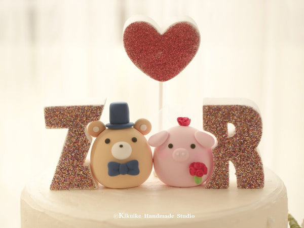 pig and bear wedding cake topper