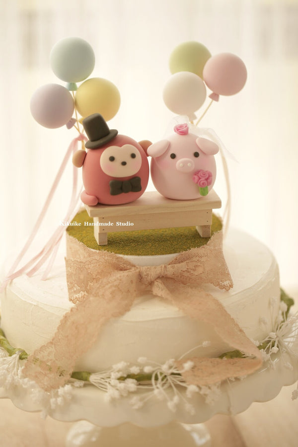 monkey and pig wedding cake topper