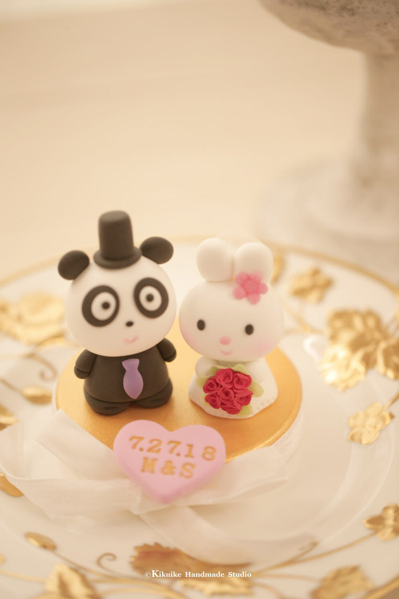 panda and bunny wedding cake topper