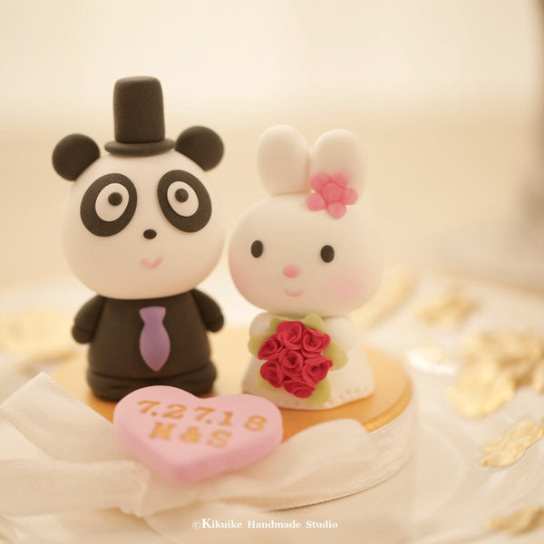 panda and bunny wedding cake topper