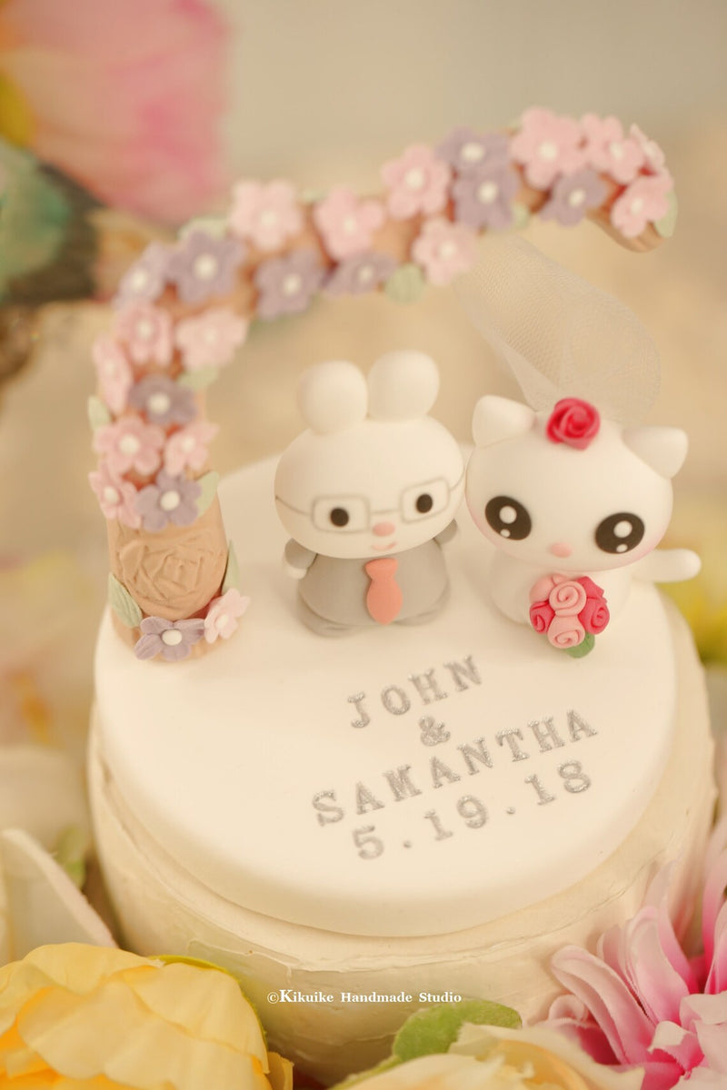 kitty and bunny wedding cake topper