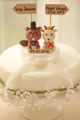 beaver and goat wedding cake topper