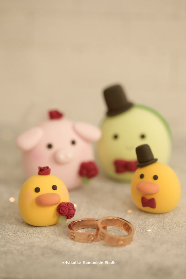 pig and turtle wedding cake topper
