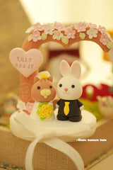 bunny and squirrel wedding cake topper