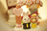 bunny and squirrel wedding cake topper