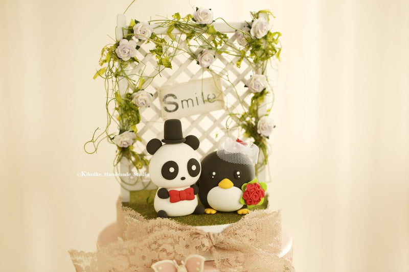 penguin and panda wedding cake topper