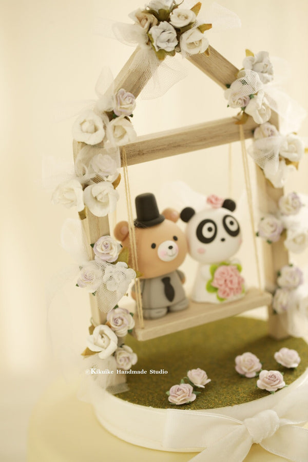 panda and bear wedding cake topper