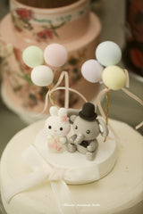 bunny and elephant wedding cake topper
