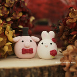 pig and bunny wedding cake topper