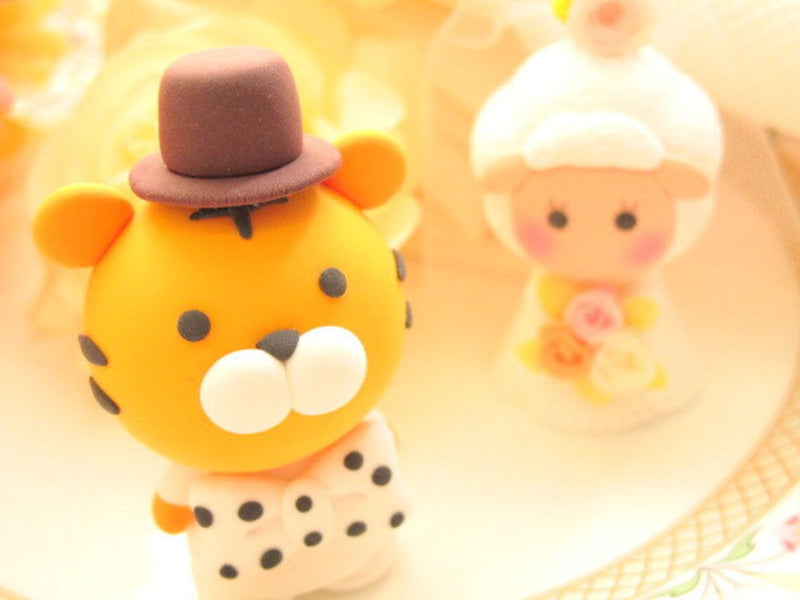 tiger and sheep wedding cake topper