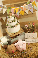 pig and moose wedding cake topper