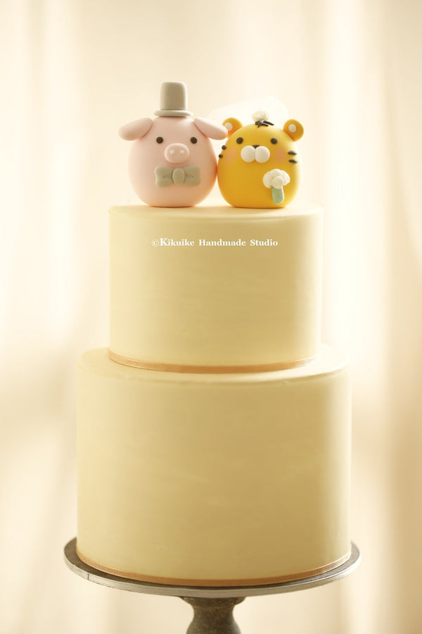 pig and tiger wedding cake topper