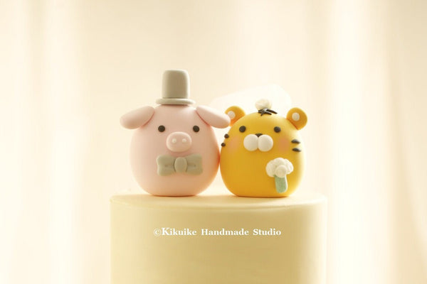 pig and tiger wedding cake topper