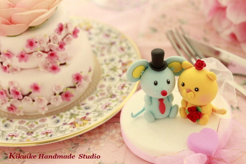 mouse and tiger wedding cake topper