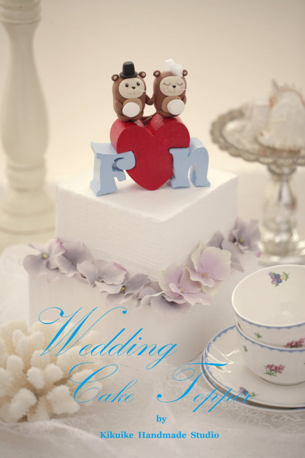 otters wedding cake topper
