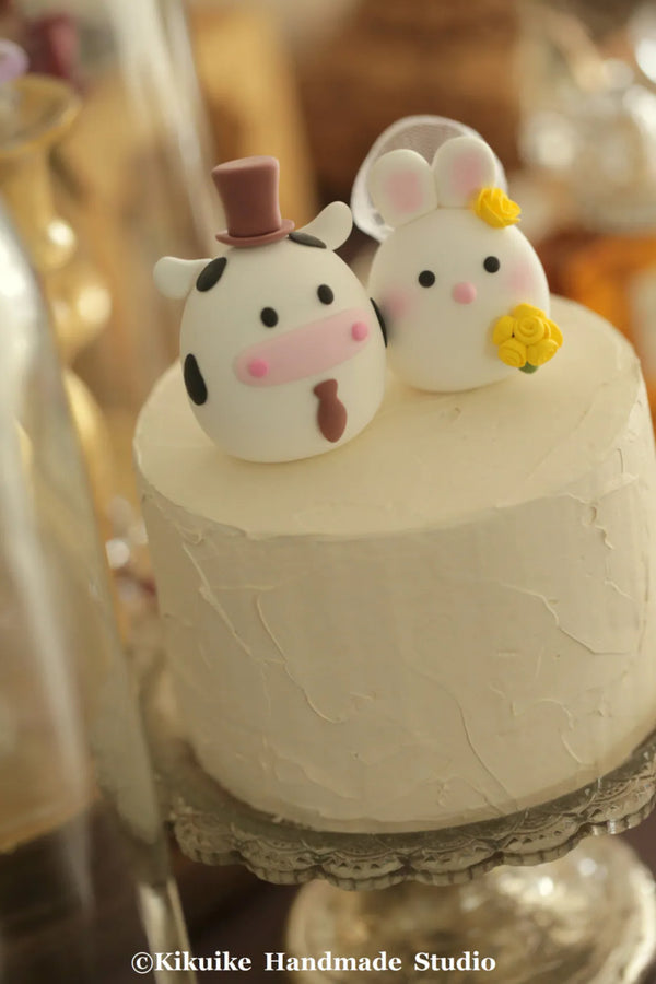 bunny and cow, rabbit and ox wedding cake topper