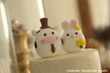 bunny and cow, rabbit and ox wedding cake topper