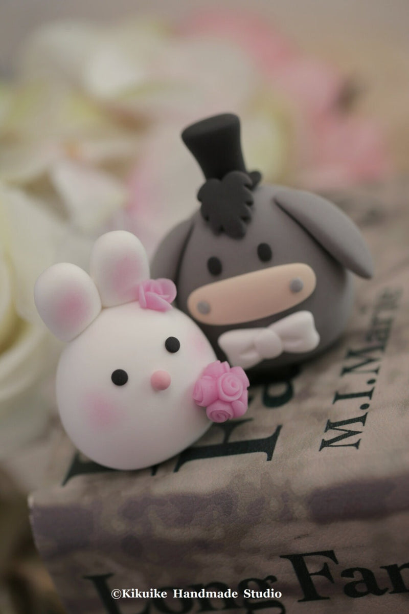 bunny and donkey wedding cake topper