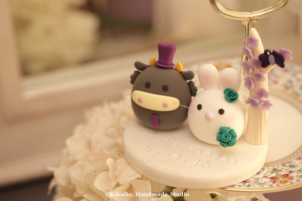 bunny and dragon wedding cake topper