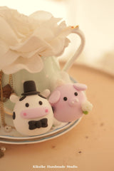 pig and cow wedding cake topper