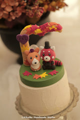 red panda and corgi wedding cake topper