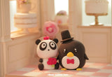 penguin and panda wedding cake topper